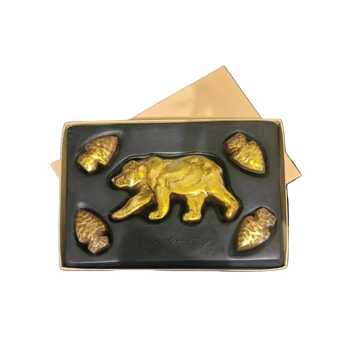 Handcrafted grizzly bear chocolate bar with arrowheads made in Bozeman, Montana